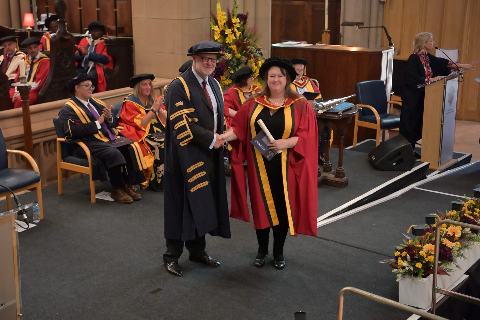 University of Greater Manchester research students celebrate their success with grand graduation at Bolton Parish Church