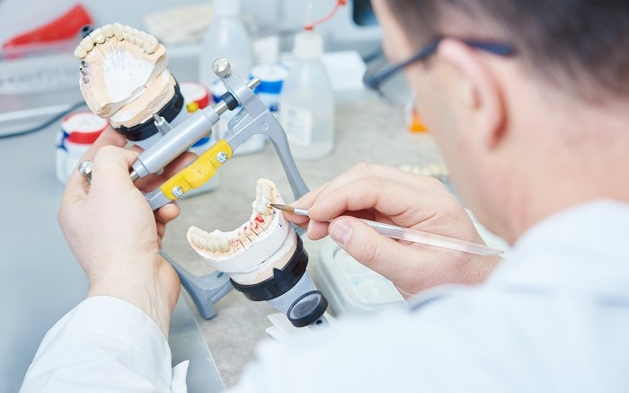 BEHIND THE SCENES OF DENTAL LABORATORIES 
