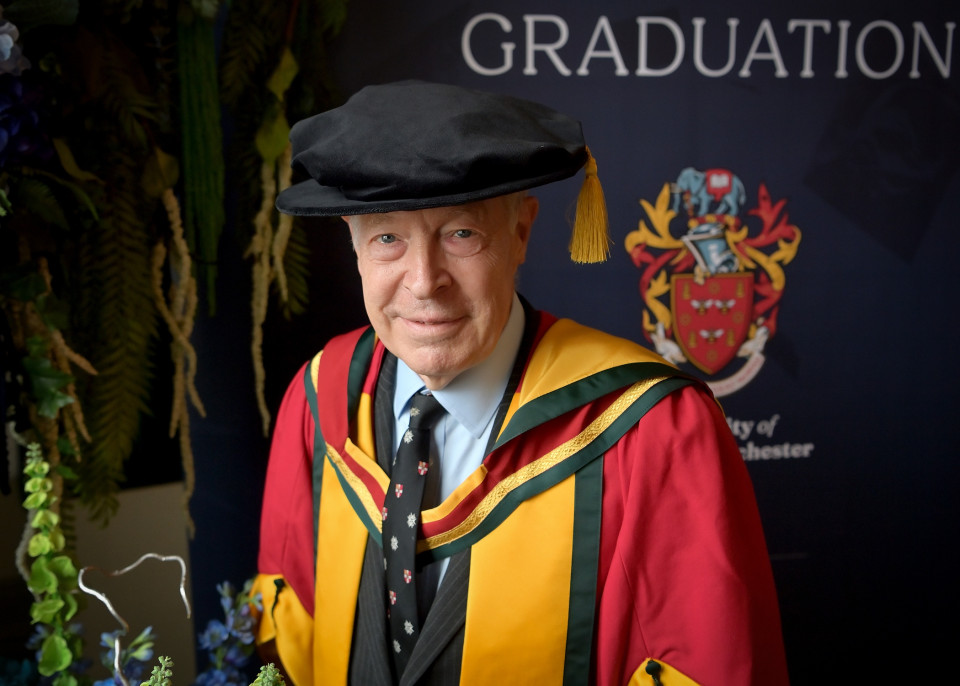 Heraldry expert who designed new University of Greater Manchester coat of arms awarded honorary doctorate