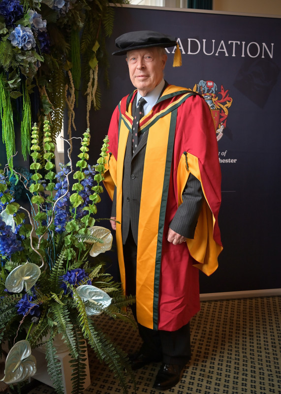 Heraldry expert who designed new University of Greater Manchester coat of arms awarded honorary doctorate