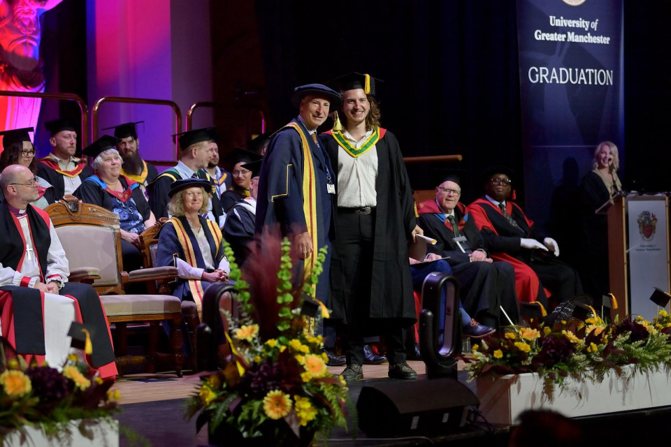 Family Pride as Assistant Vice Chancellor Presents Son with Degree