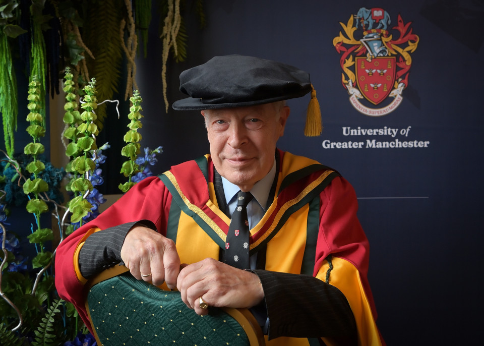 Heraldry expert who designed new University of Greater Manchester coat of arms awarded honorary doctorate