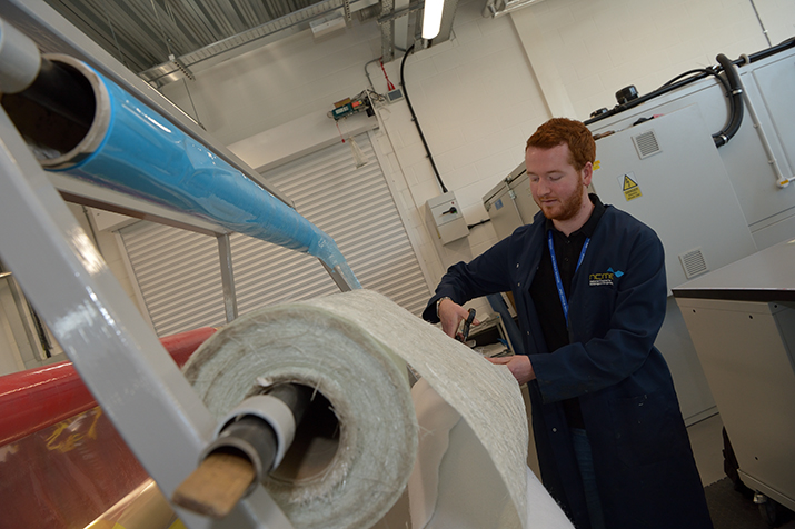 Student choosing a material to test
